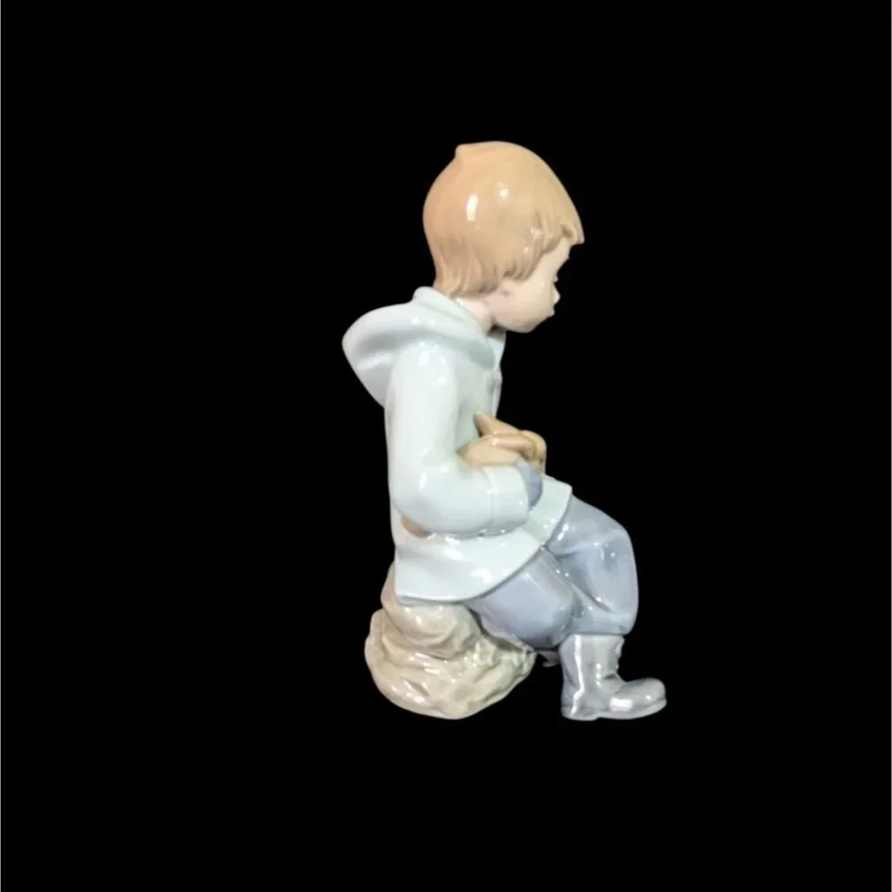 NAO by Lladro 1987 Figurine Boy Sitting on Bag Holding Bunny Rabbit‎ Vintage